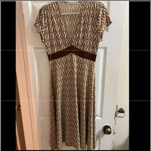 Very flattery dress.